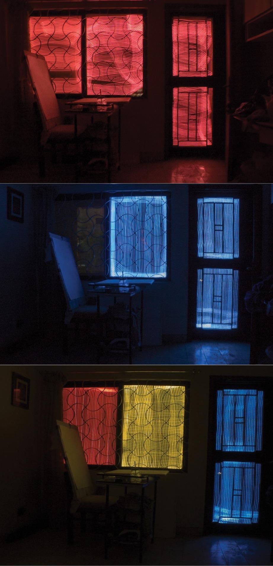Three night views of a curtained window and barred grille lit in red, blue and yellow