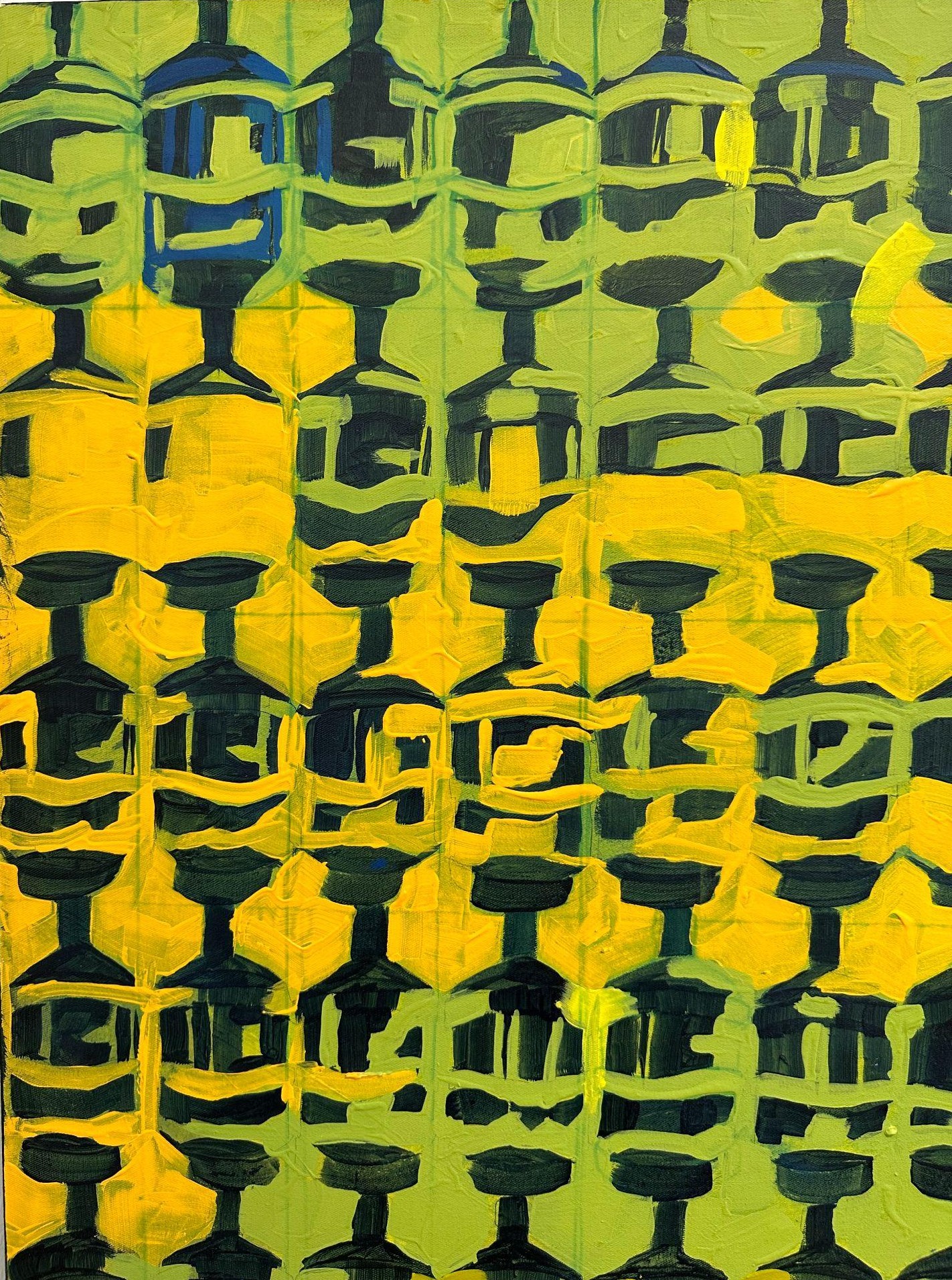 Detail: repeating geometric shapes in blue, yellow and dark grey.