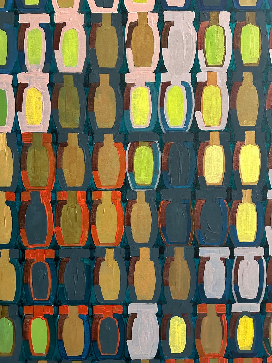 Detail: a repeating pattern of bottle-like shapes in various colours.